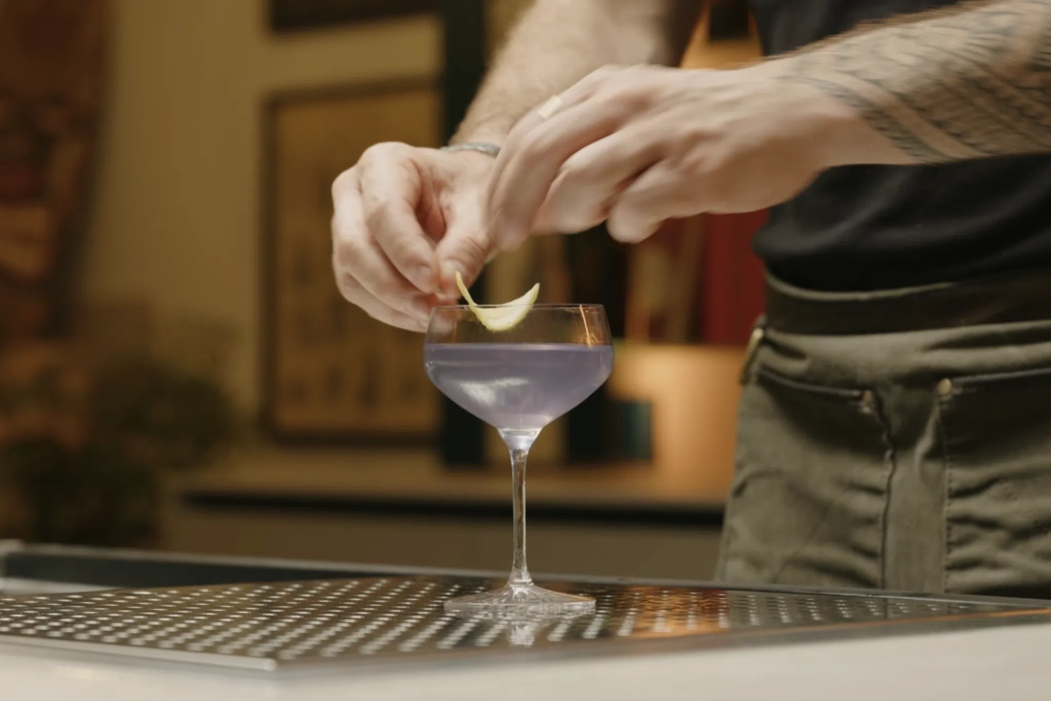 Lemon zest added to the rim of the coupe glass as garnish