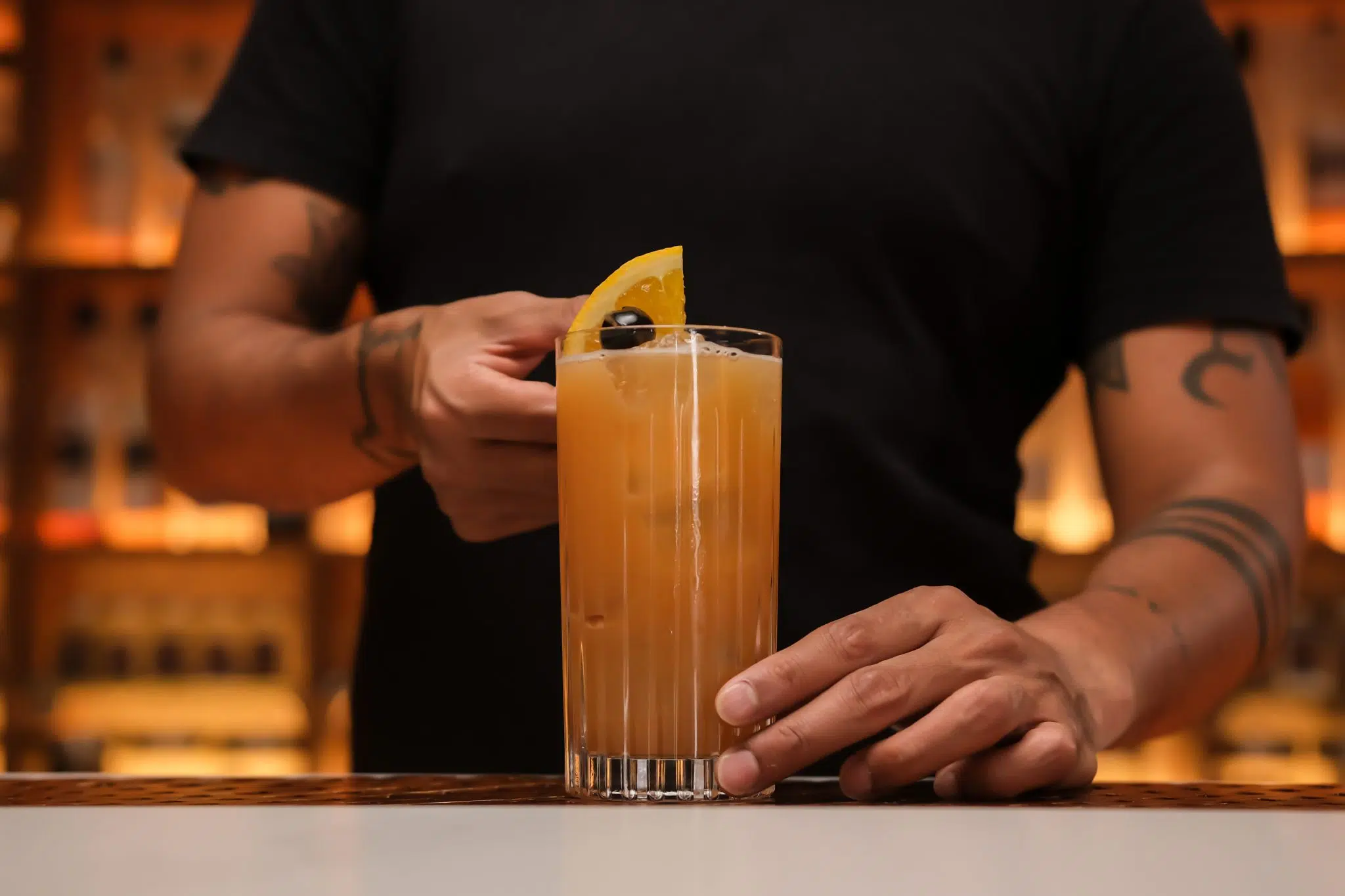 <p>Drop an orange slice or cherry as a garnish to enhance the cocktail's visual appeal and flavor</p>
