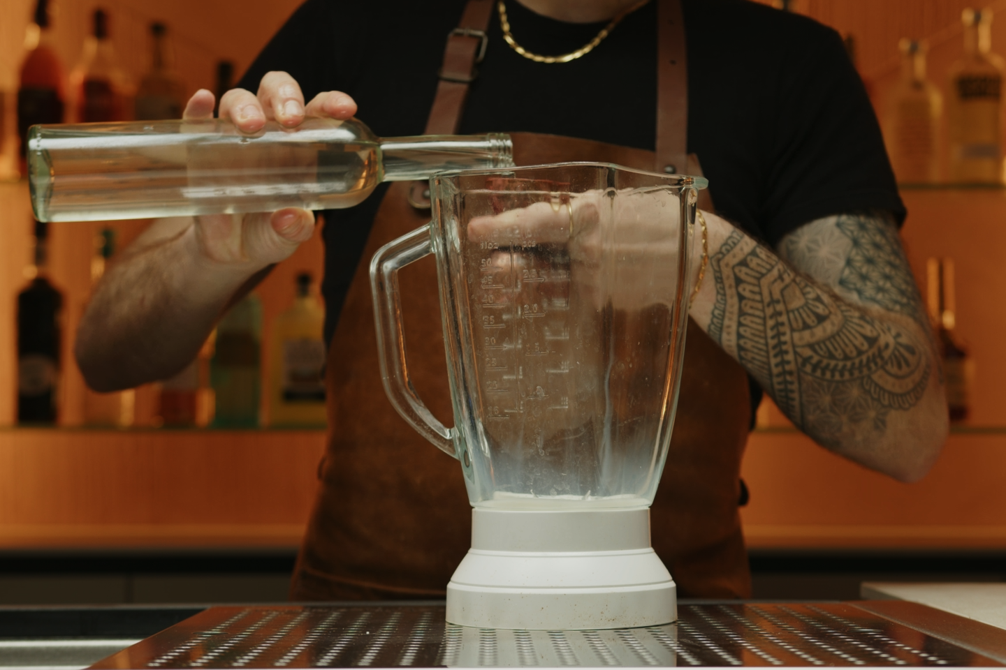 <p>Measure and pour one ounce of coconut water.</p>
