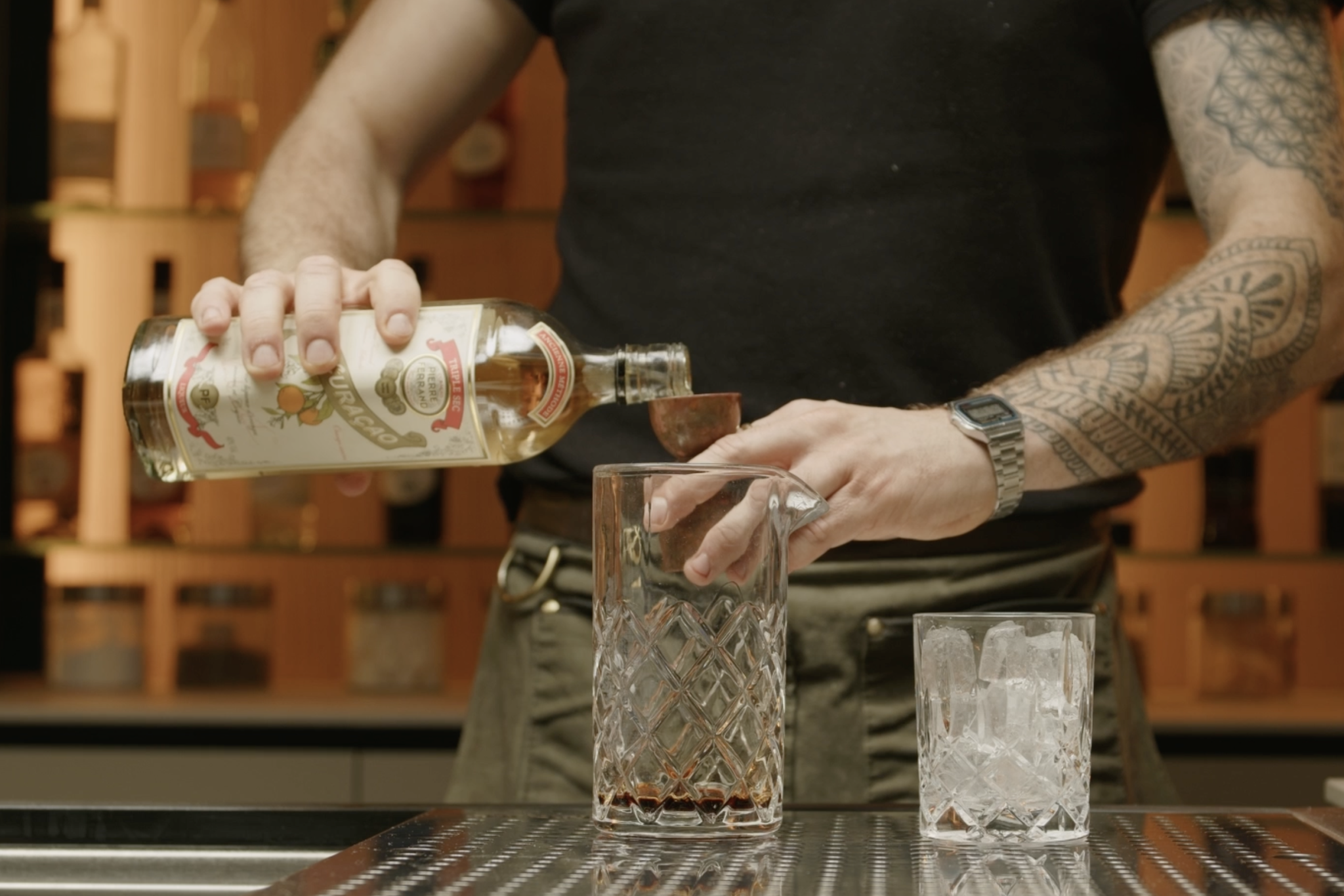 <p>Follow this with ¾ ounce of Orange Curaçao liqueur, which infuses a bright and zesty citrus flavor and acts as a sweetening agent.</p>