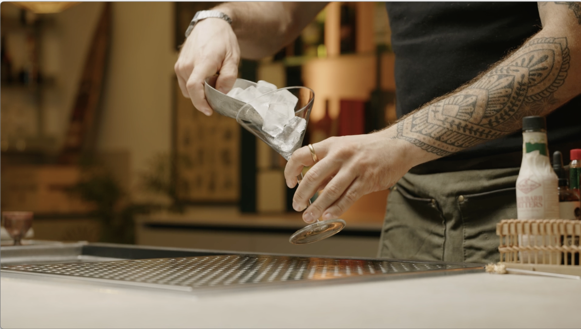 <p>Fill a coupe or martini glass with ice cubes.</p>