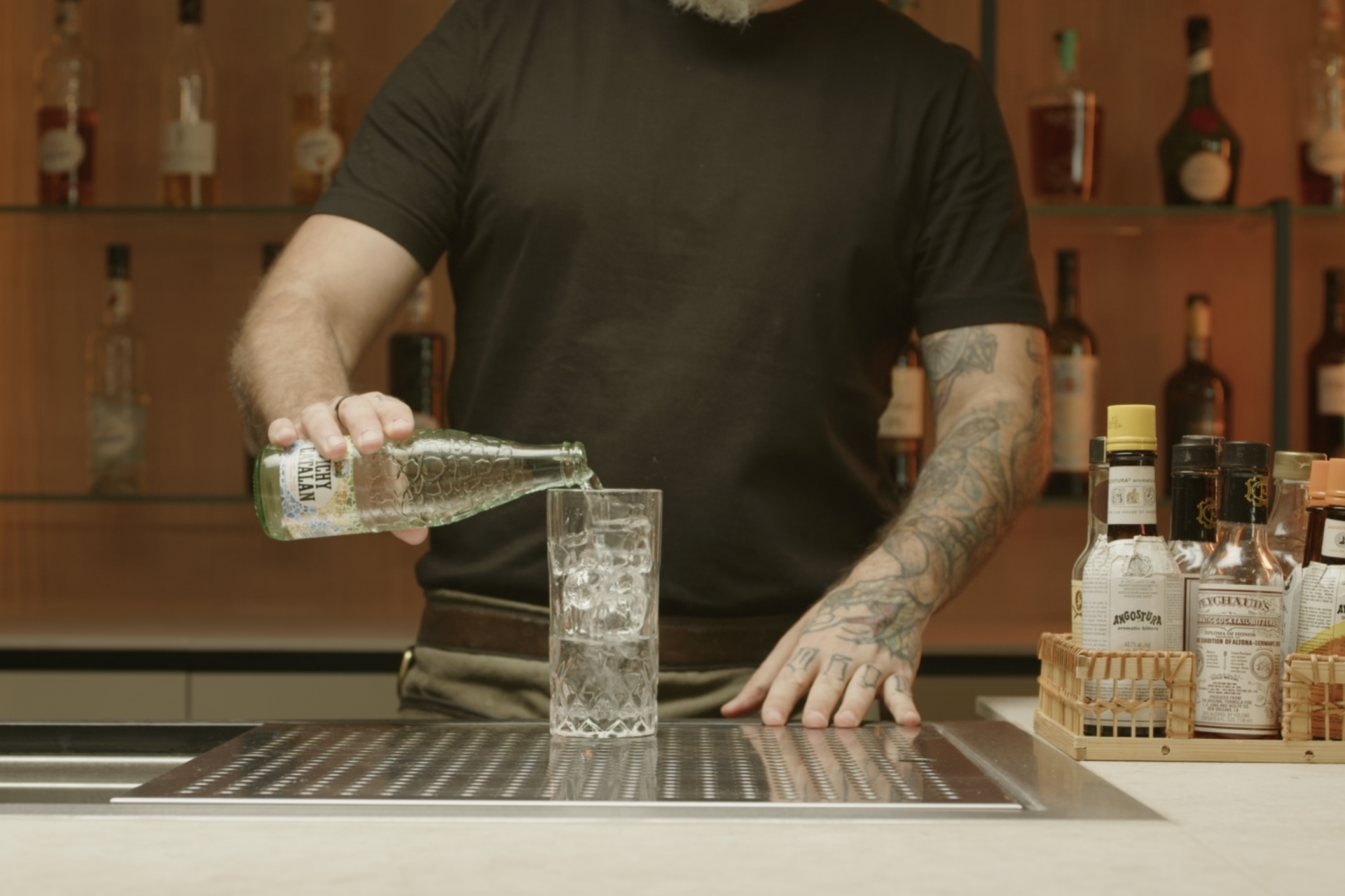 <p>Top off the glass with soda water, adding bubbles and lightening the cachaça.</p>