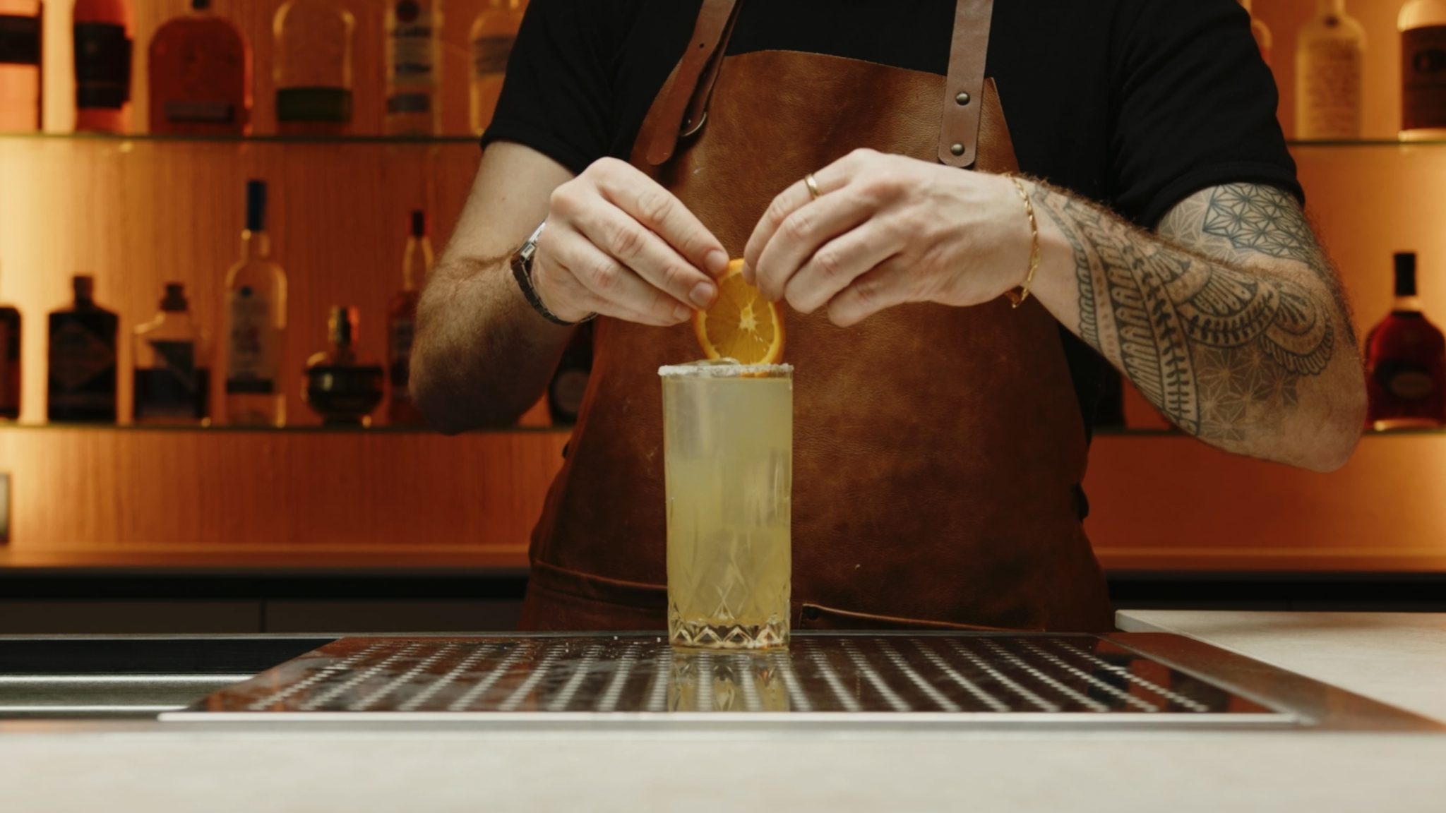 <p>Place a few citrus slices into the glass to enhance the visual appeal and aroma of the cocktail.</p>
