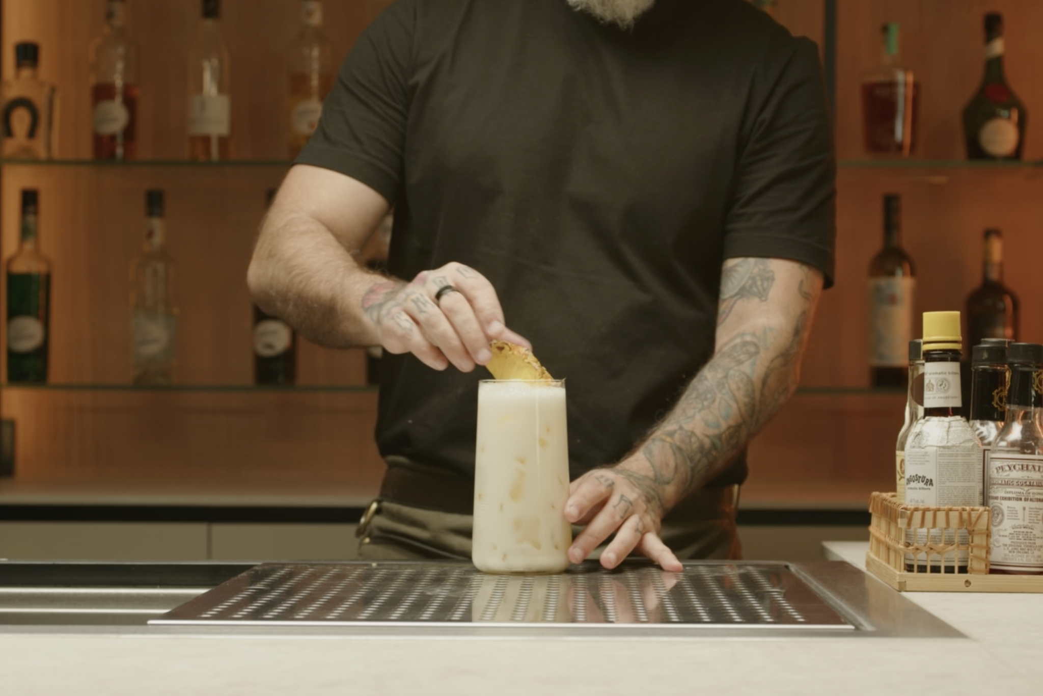 <p>Garnish the drink with a pineapple slice or wedge on the rim of the glass.</p>