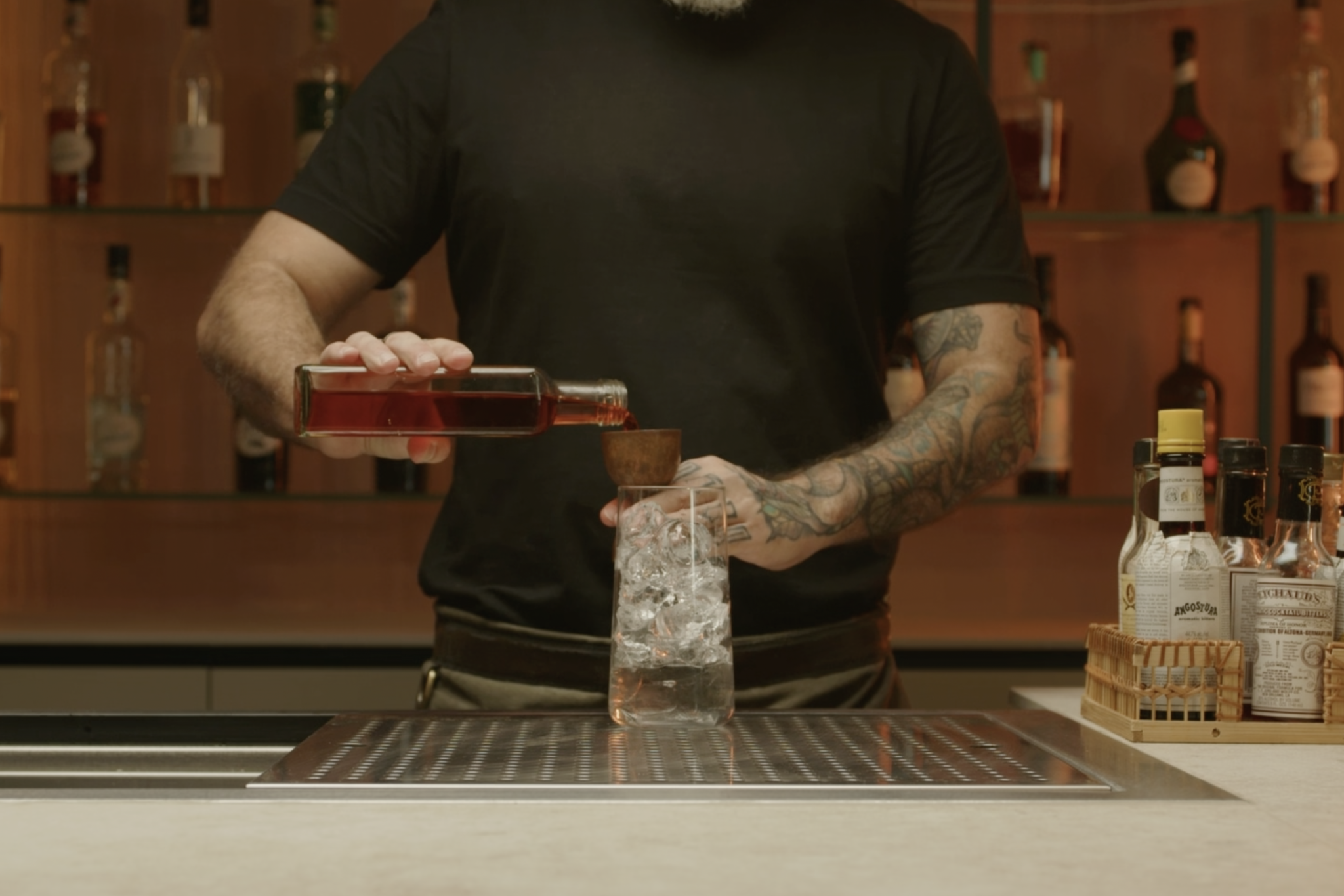 <p>Add 3 oz of cranberry juice to the glass, giving the drink its tart and slightly sweet flavor.</p>