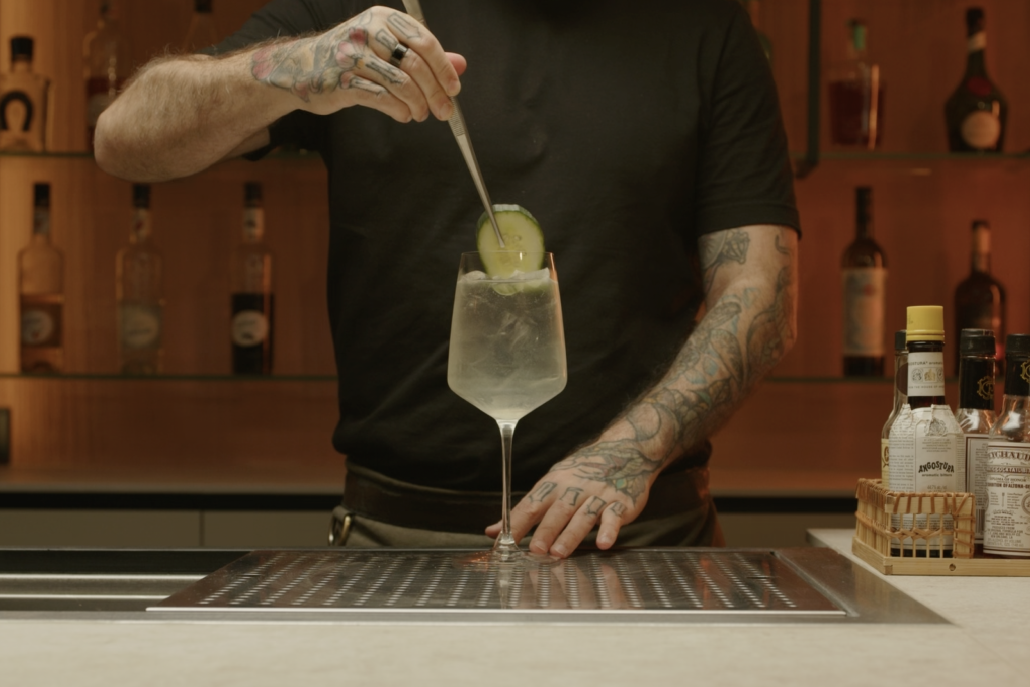 <p>Place a cucumber slice or lime wheel into the glass for garnish.</p>