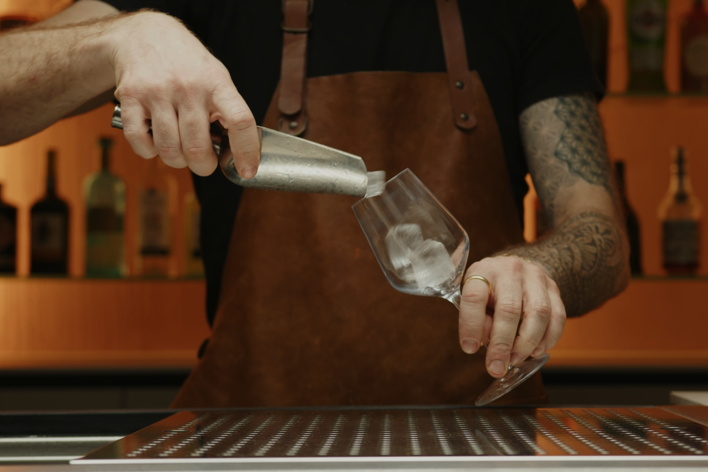 <p>Start by filling the glass with a generous amount of ice cubes. This will ensure that your Cynar Spritz stays cool and refreshing for longer.</p>
