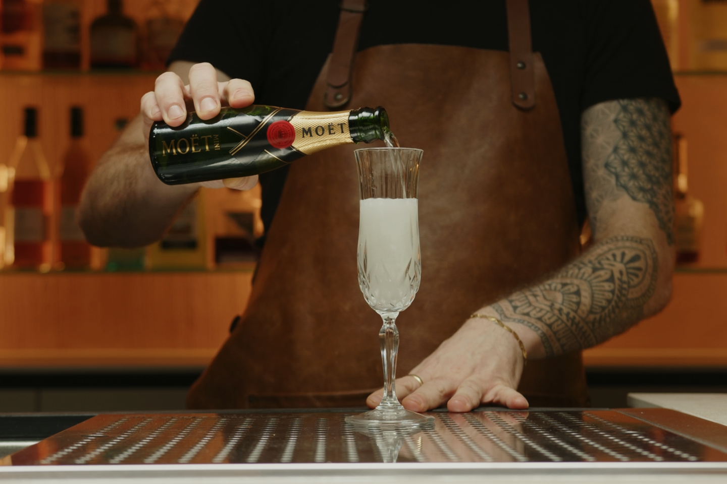 <p>Top the cocktail with champagne (more or less 2 oz, depending on the glass you’re using). The champagne adds a bubbly, festive element to the French 75, making it perfect for celebrations.</p>
