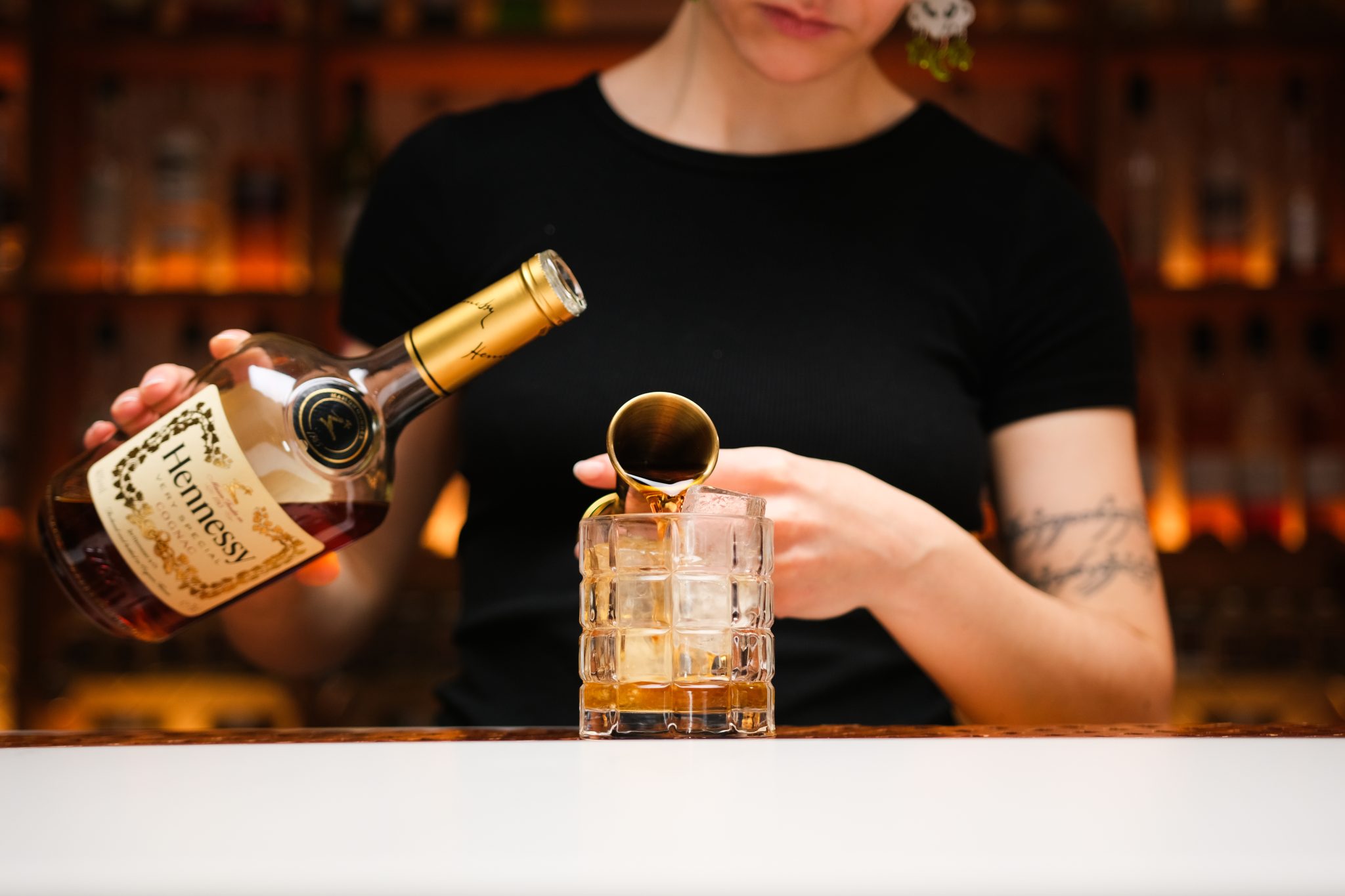 <p>Pour in the cognac, allowing its deep notes to be the base of your cocktail.</p>
