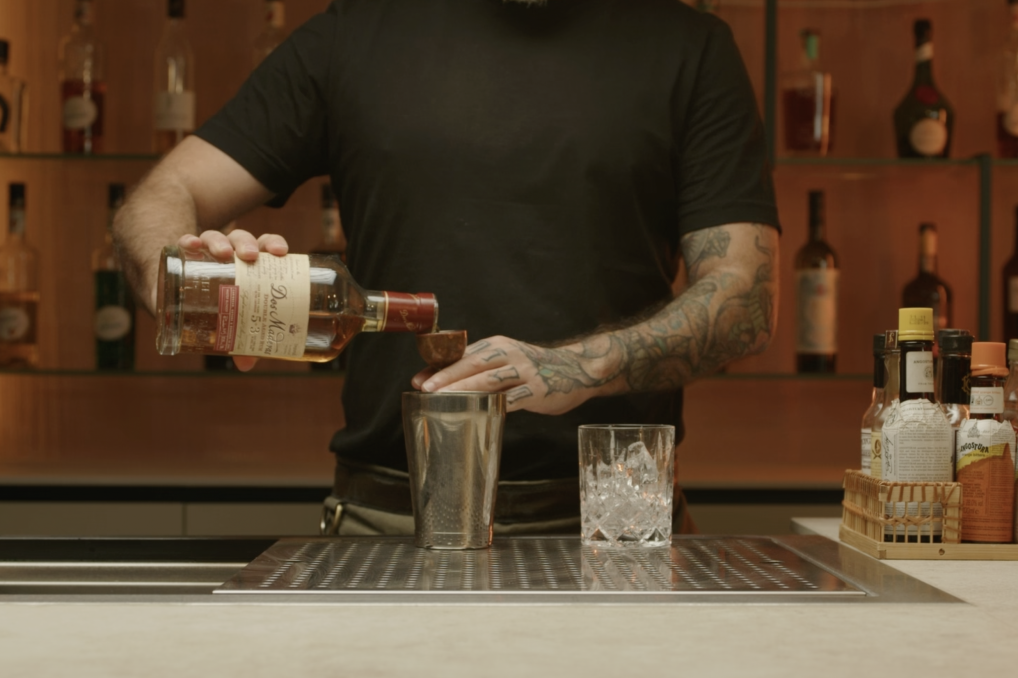 <p>Measure and add 1 oz of gold rum to the shaker.</p>