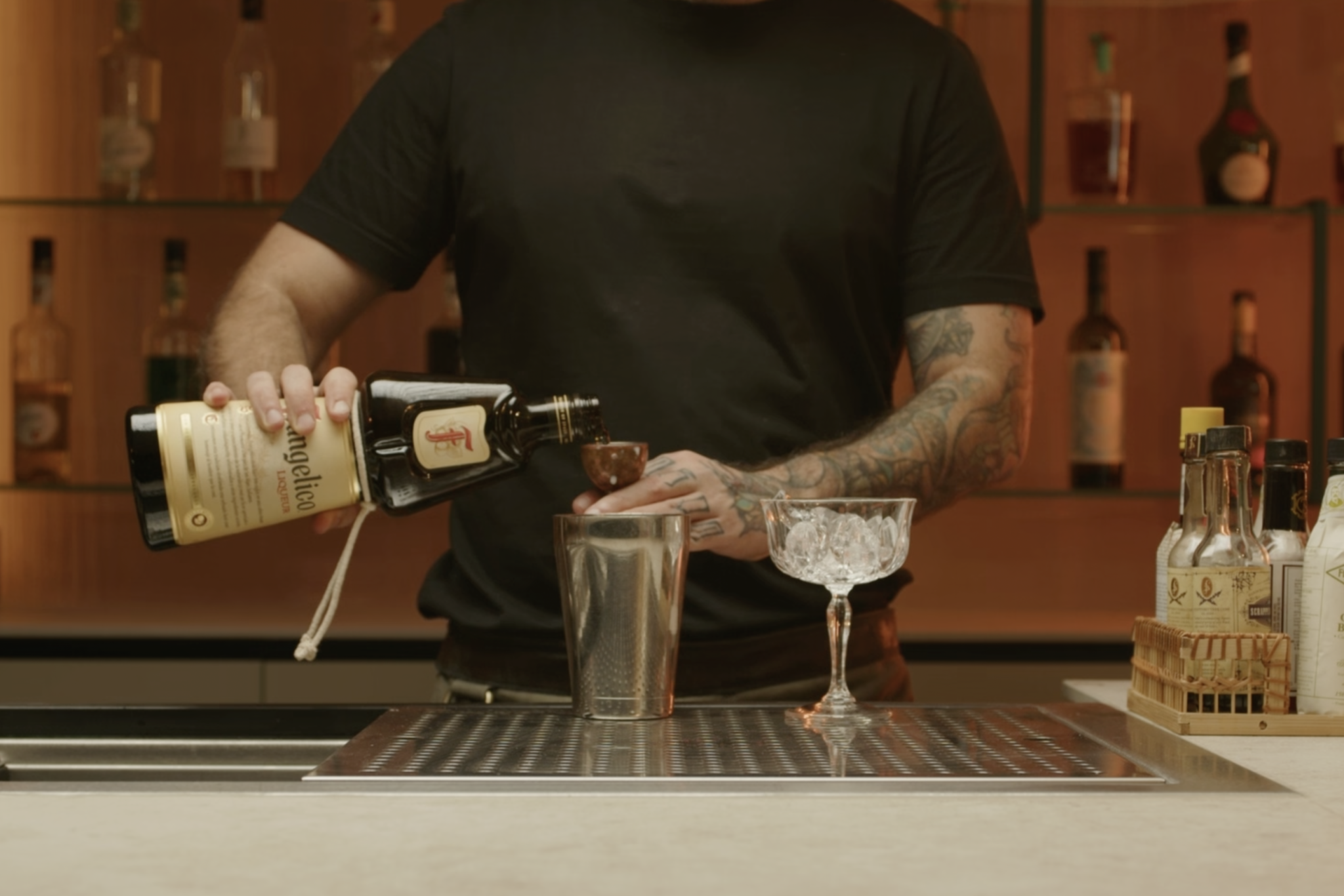 <p>Measure and add 1 oz of dark crème de cacao liqueur.</p>