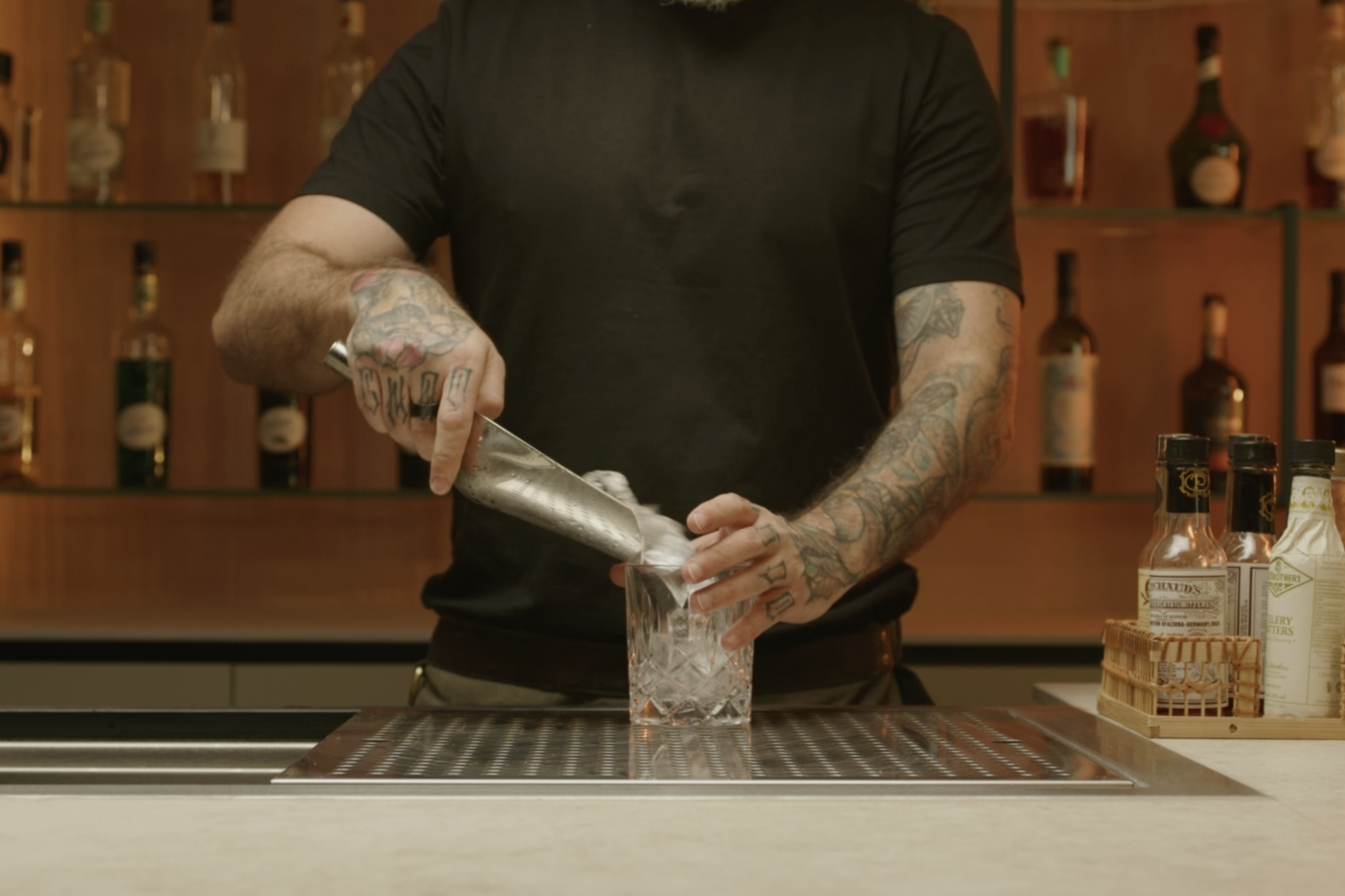 <p>Chill your old fashioned glass with some ice.</p>