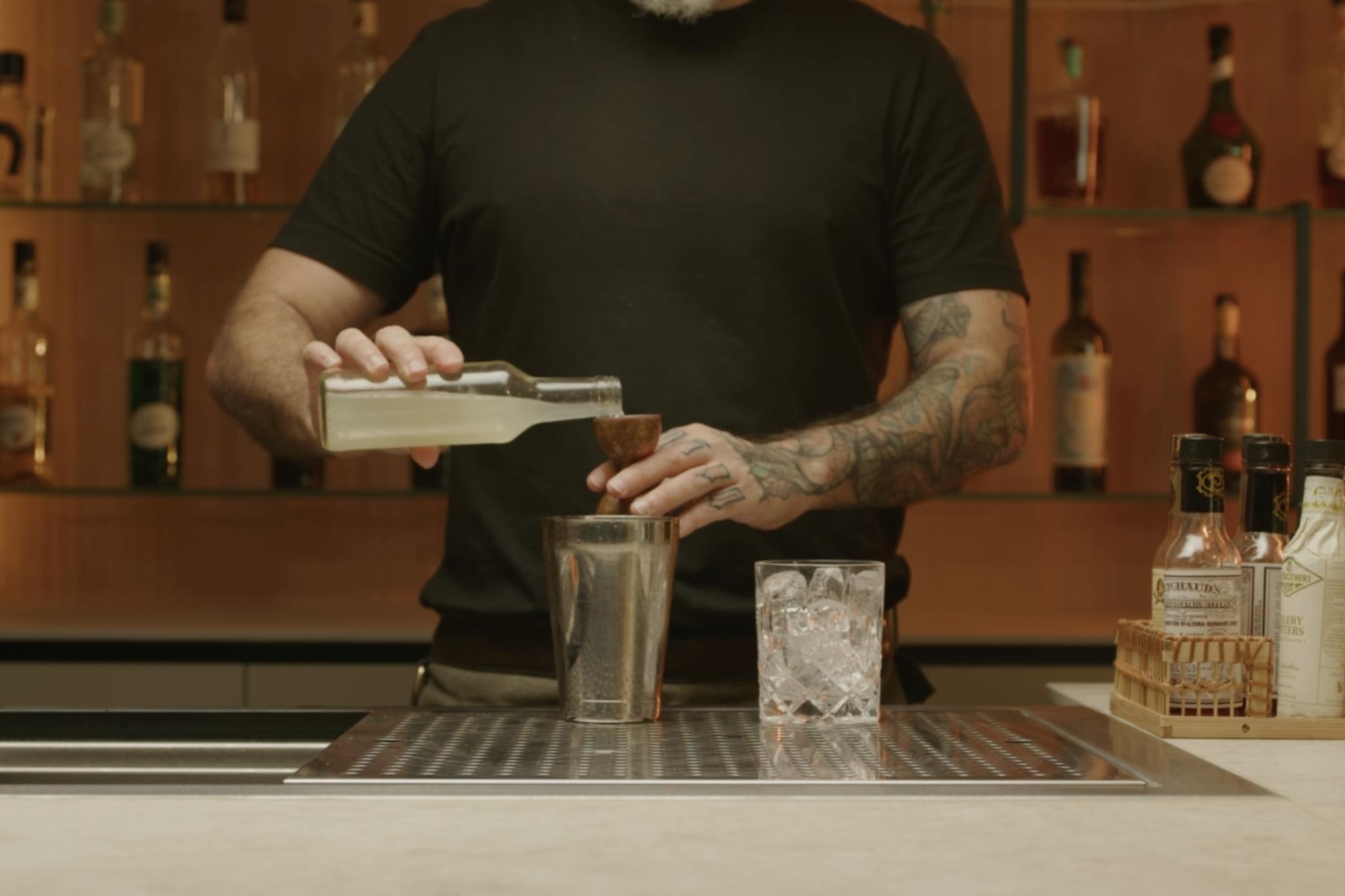 <p>Squeeze fresh lemon juice and pour ¾ oz into the shaker.</p>