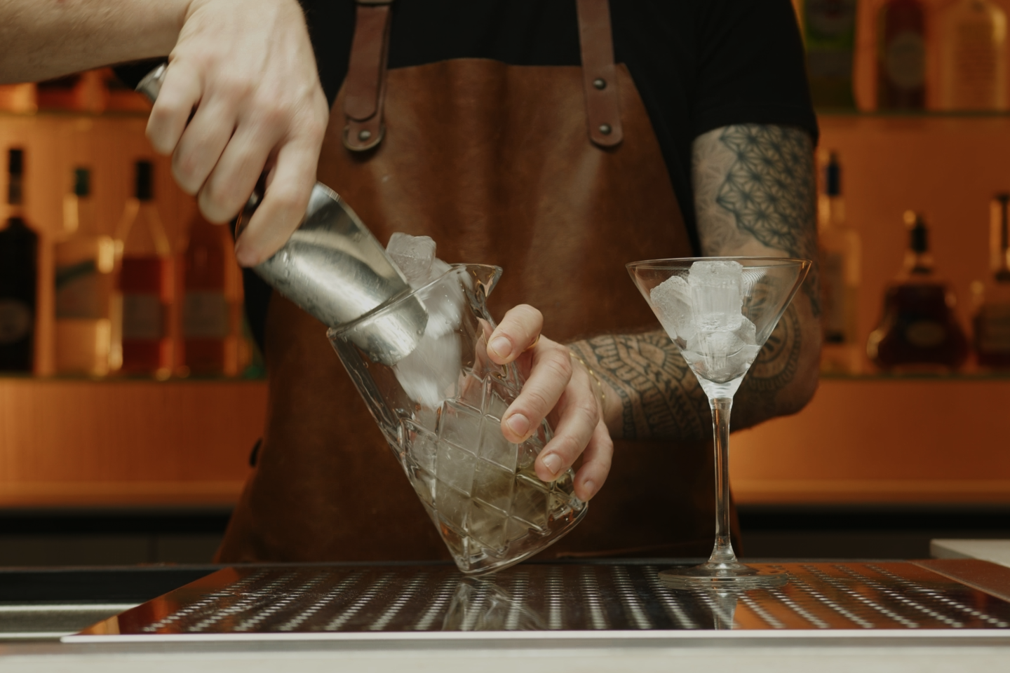 <p>Fill the mixing glass with ice.</p>