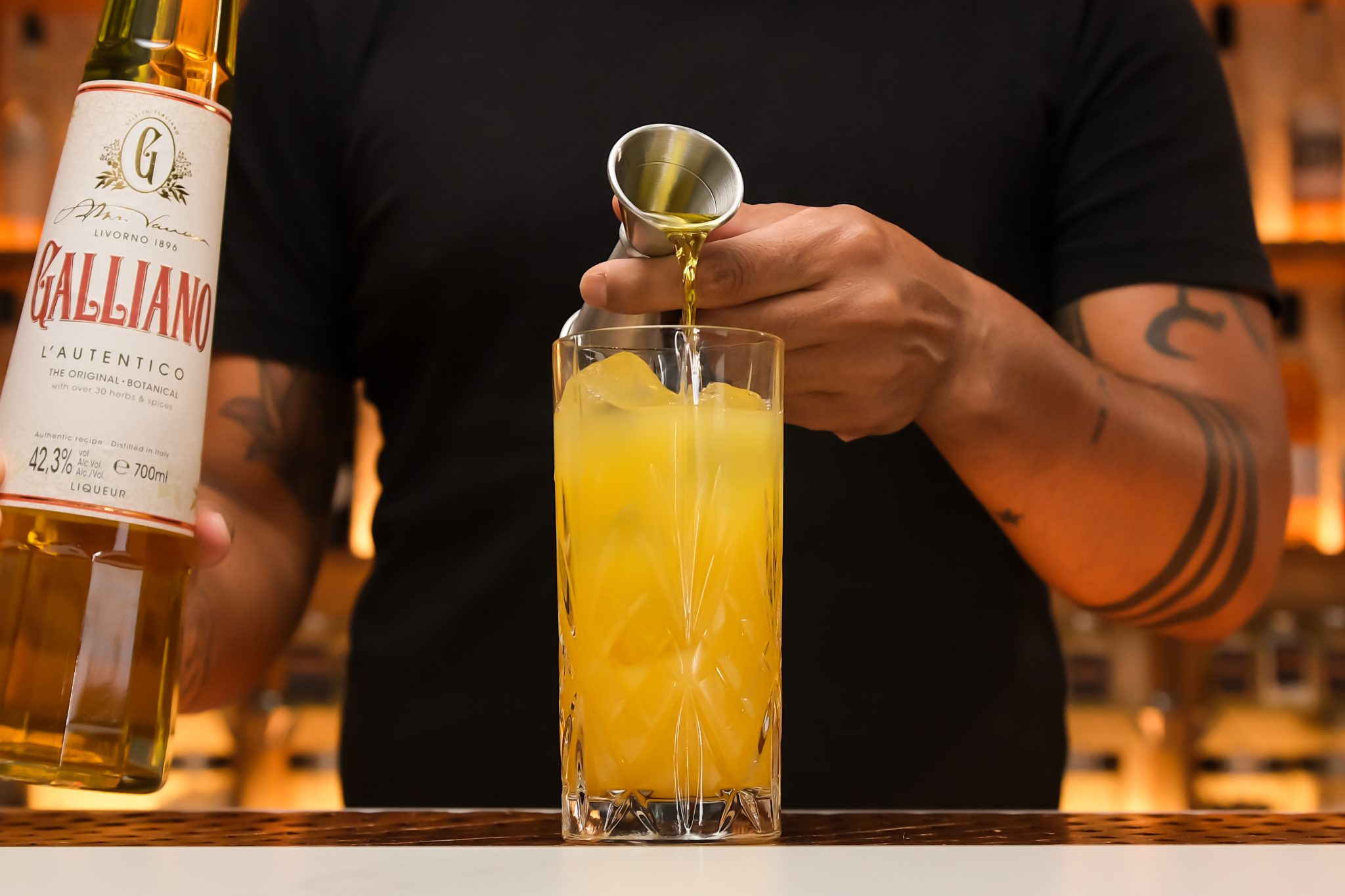 <p>Carefully float ½ oz of Galliano on top of the mixture, adding an herbal complexity to the drink.</p>

