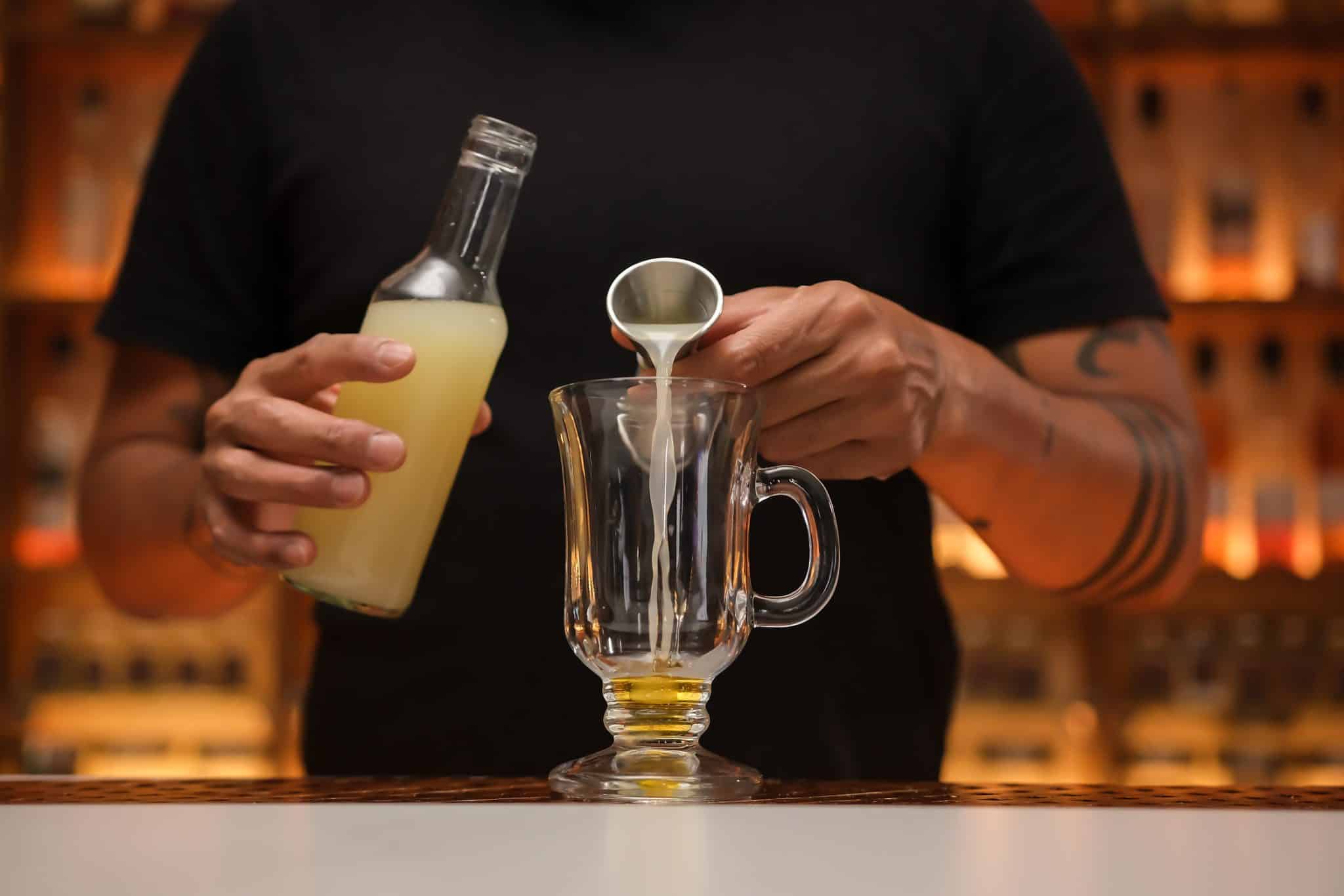 <p>Squeeze ½ oz of lemon juice into the mug to introduce a bit of acidity.</p>
