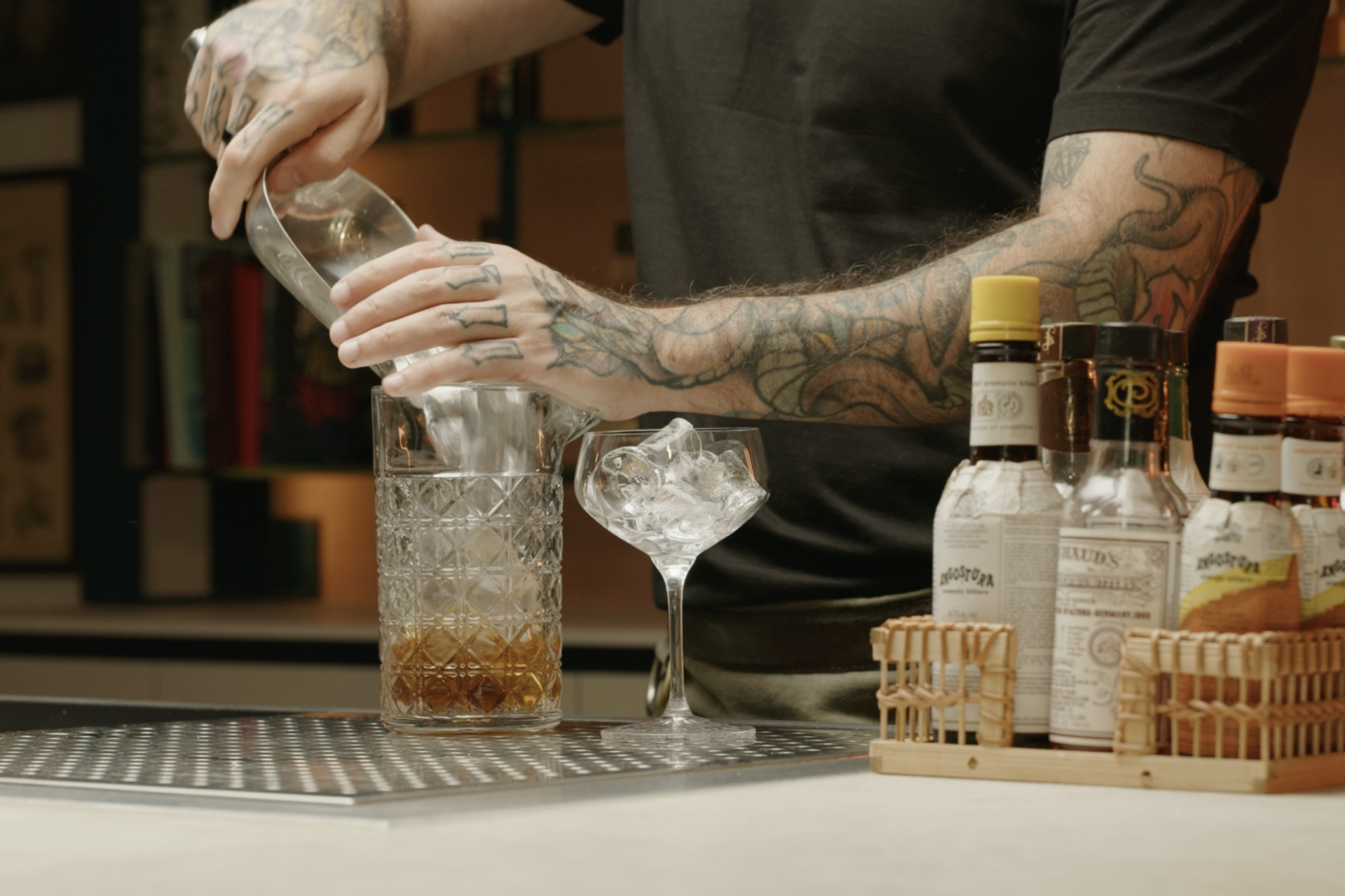 <p>Fill your mixing glass three quarters full with ice cubes.</p>