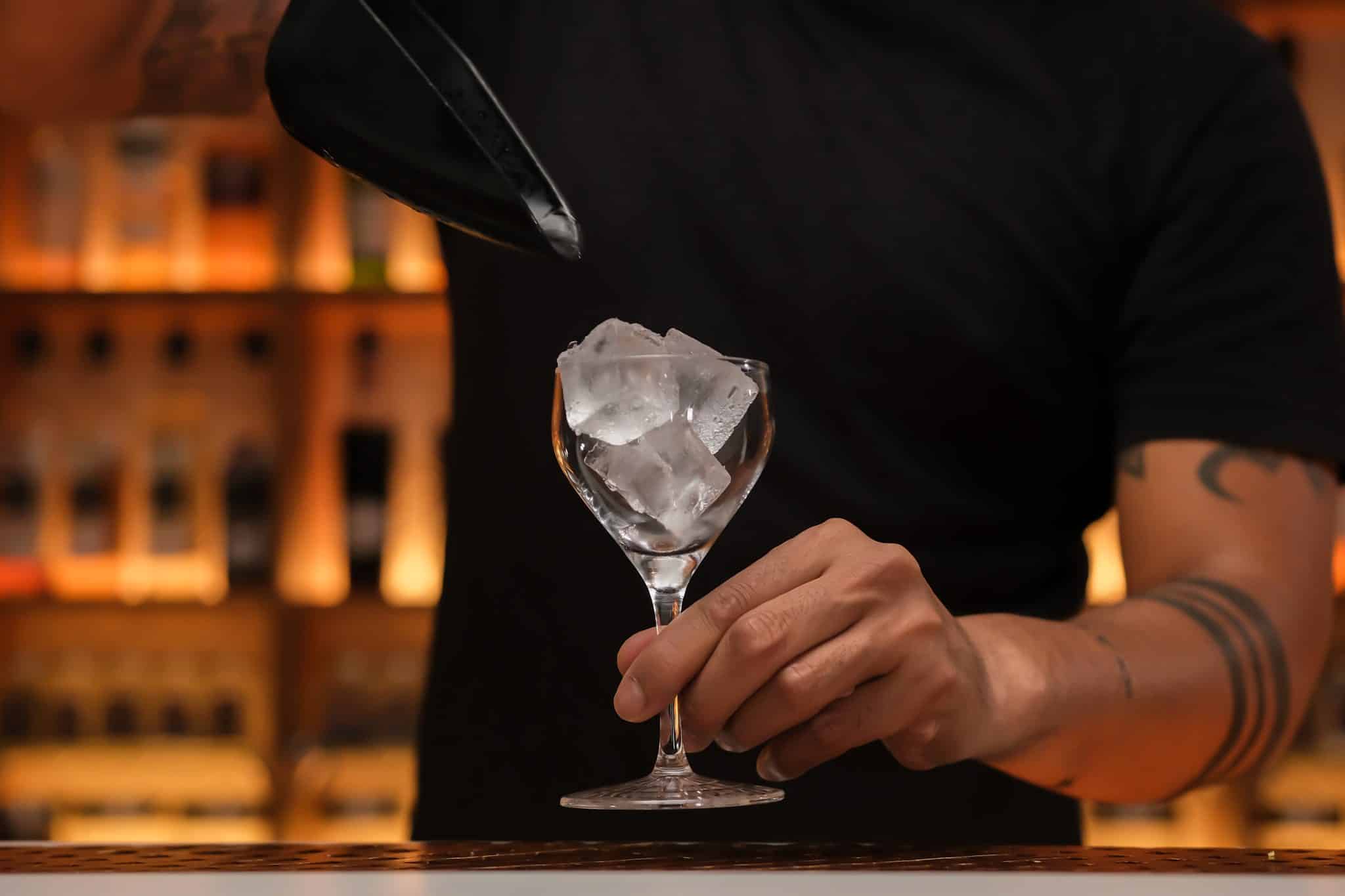 <p>First, fill your cocktail glass with ice cubes to chill.</p>
