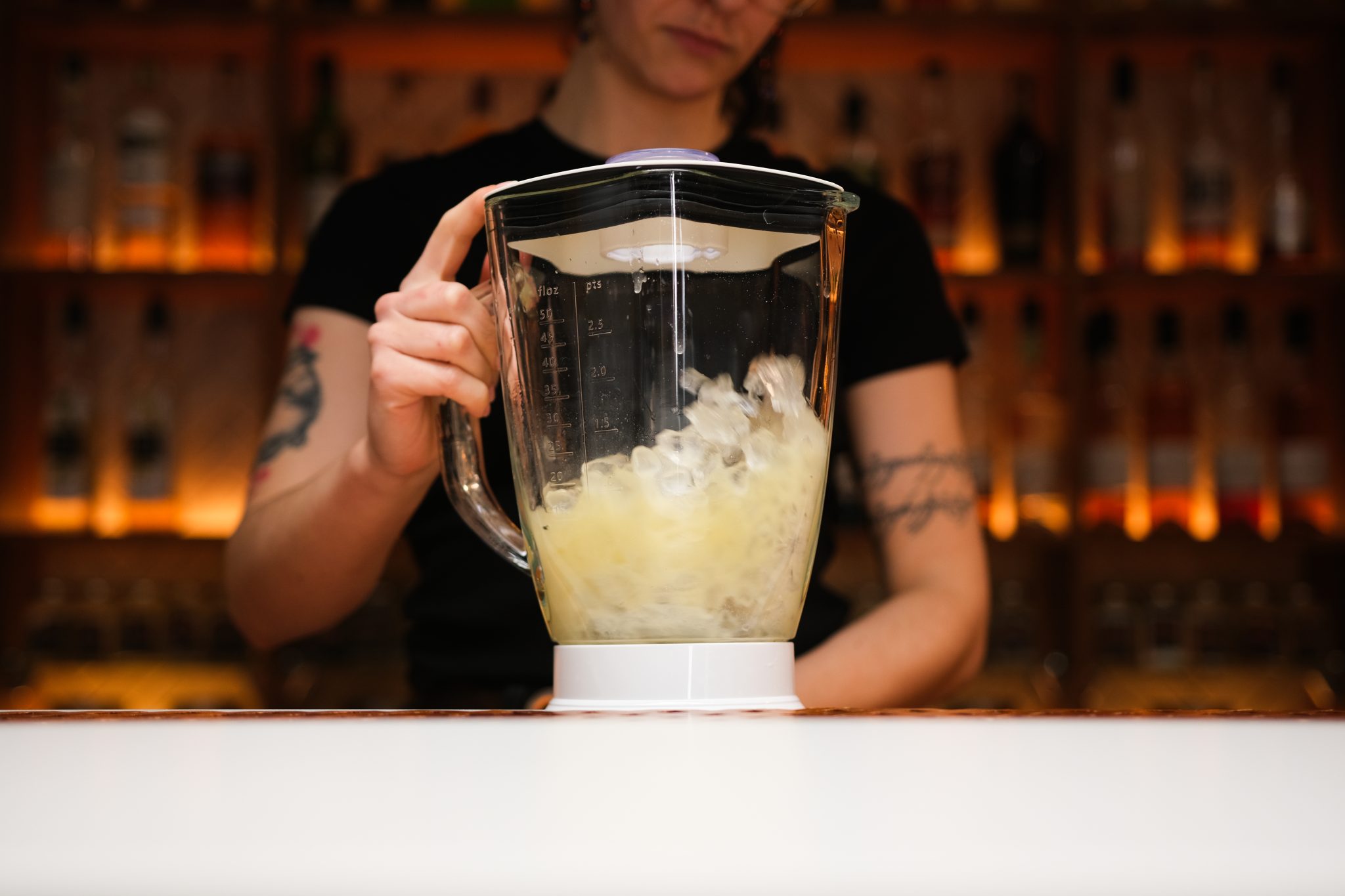 <p>Blend the mixture until it reaches a smooth, creamy consistency, creating the Piña Colada layer</p>
