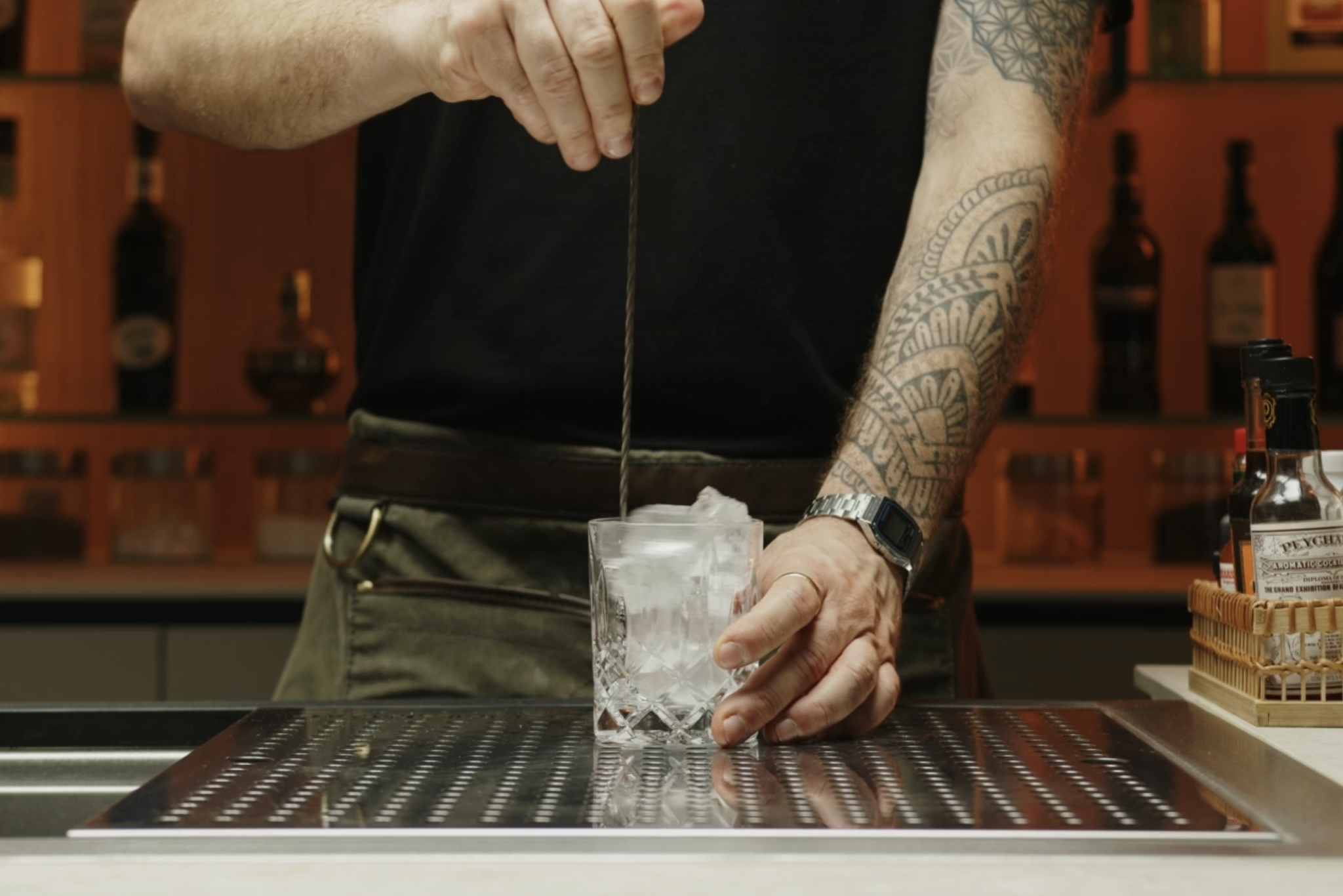 <p>Begin by filling an Old Fashioned glass with ice cubes to chill it, ensuring the glass is properly cooled. Set it aside while you prepare the cocktail.</p>
