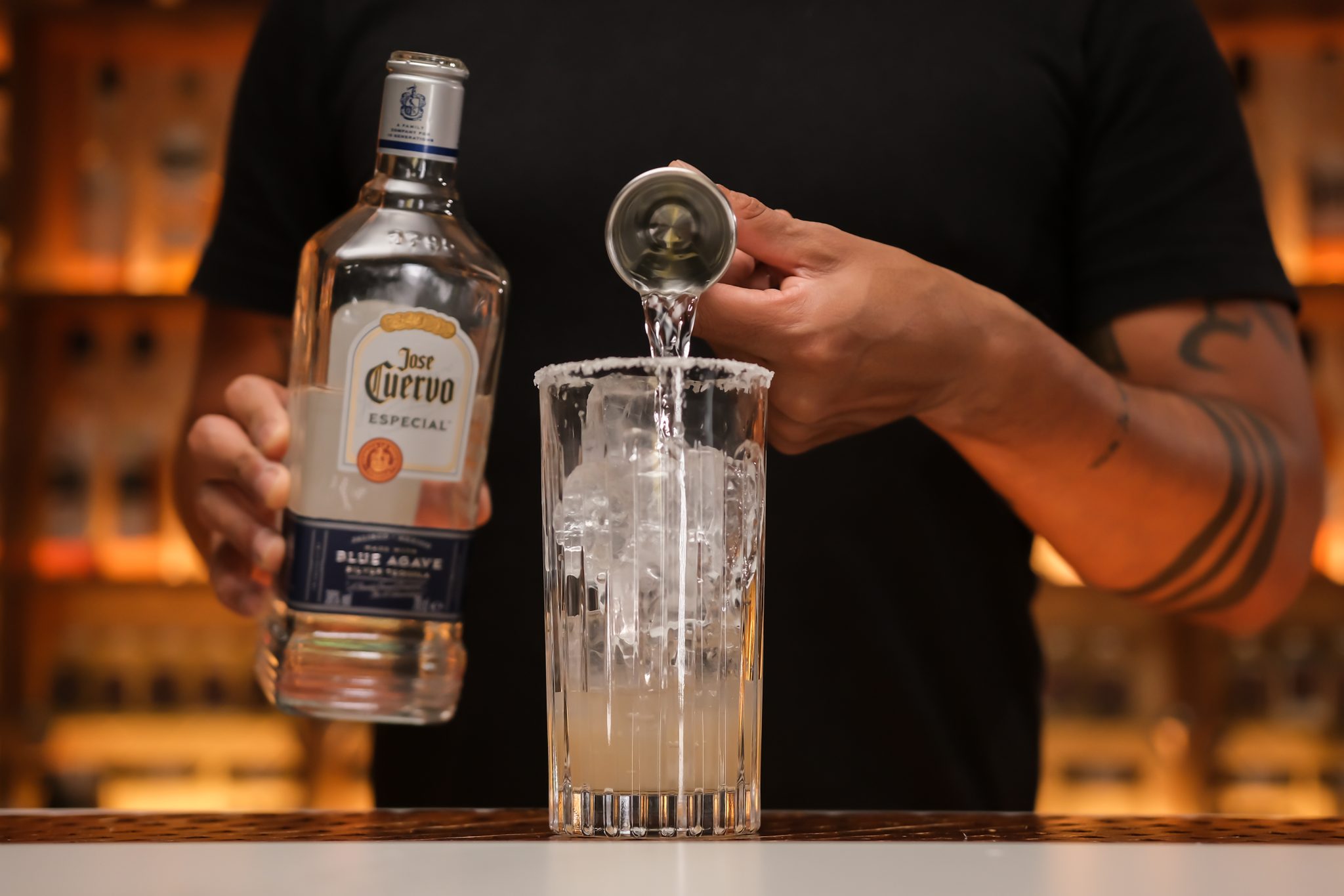 <p>Pour 2 oz of Tequila over the ice to set the base for your cocktail.</p>
