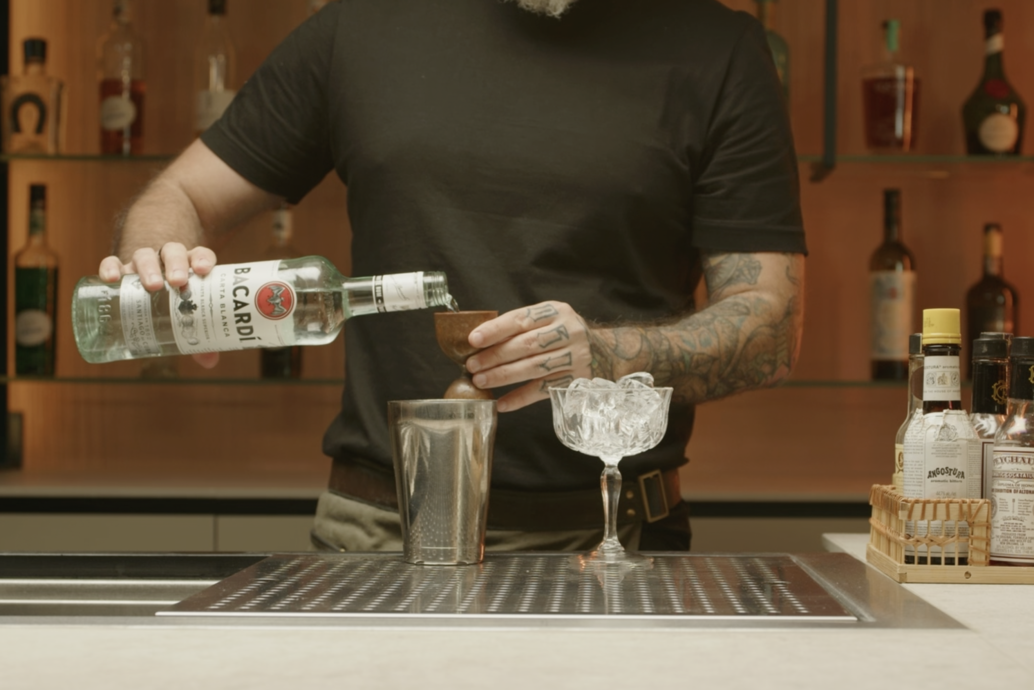 <p>Pour 1½ oz of white rum into a shaker.</p>