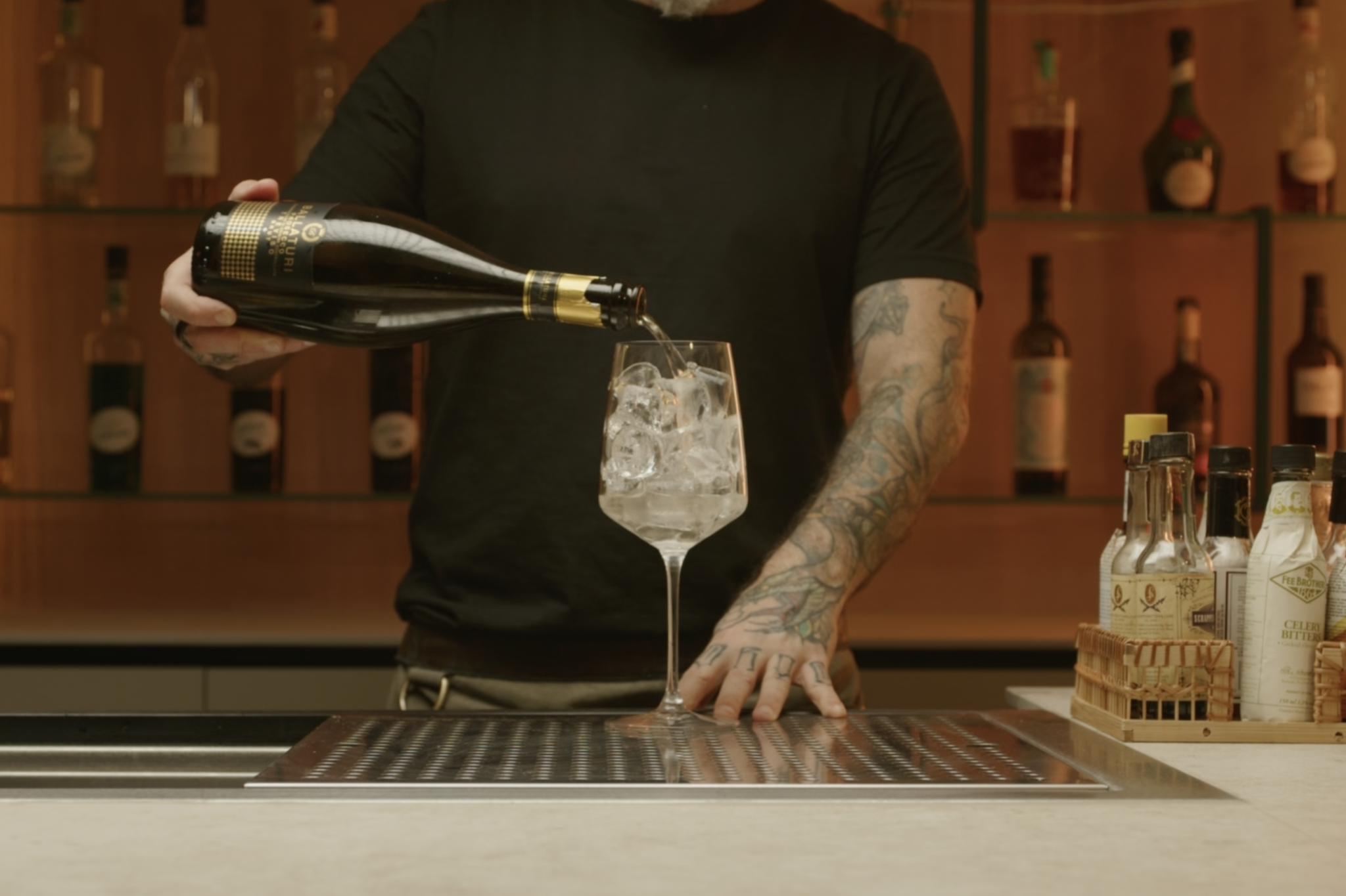 <p>Fill your glass with prosecco, having in mind that you need some space for the soda water.</p>