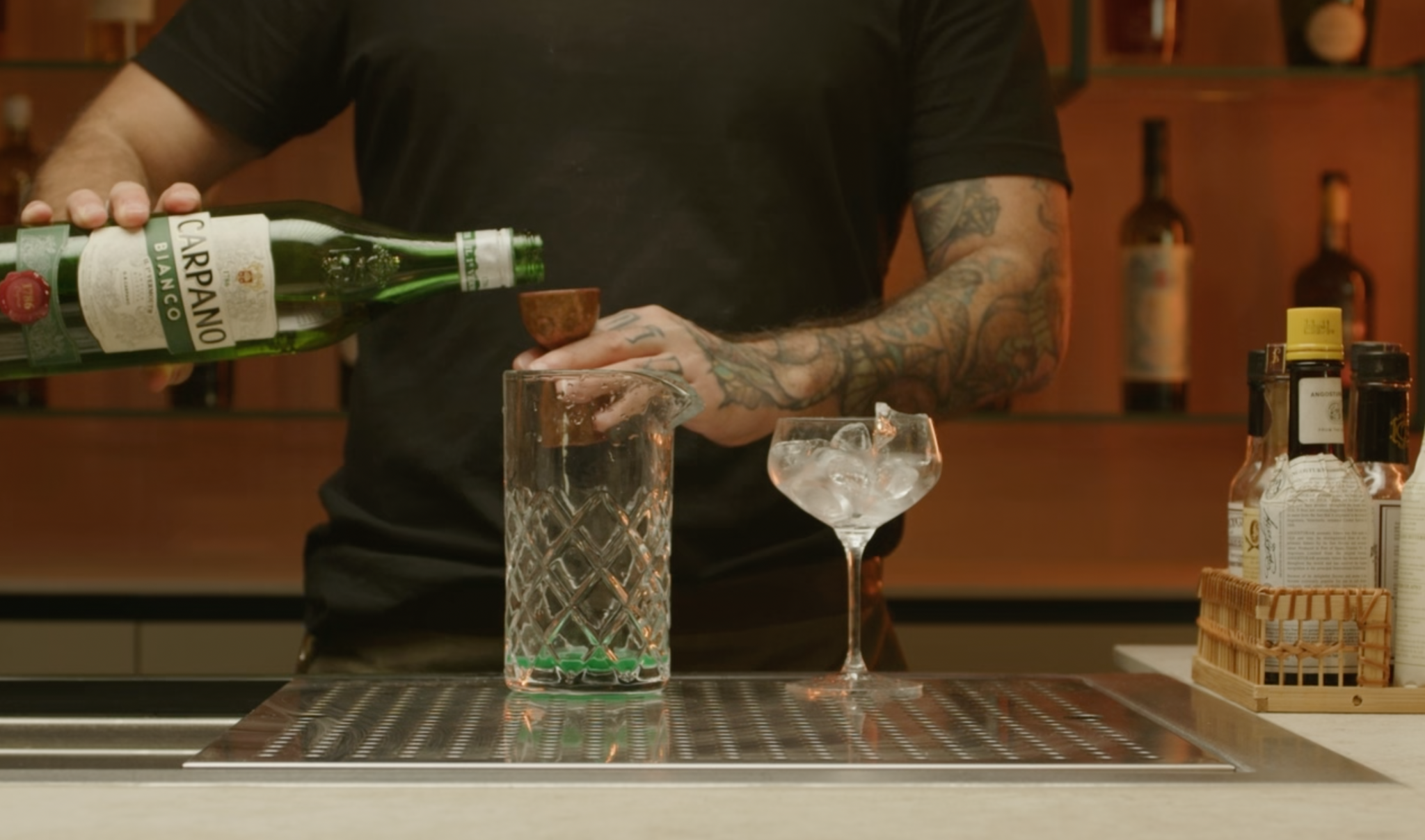 <p>Measure and pour ¾ oz of Vermouth Blanc into the glass, contributing herbal and slightly sweet notes.</p>