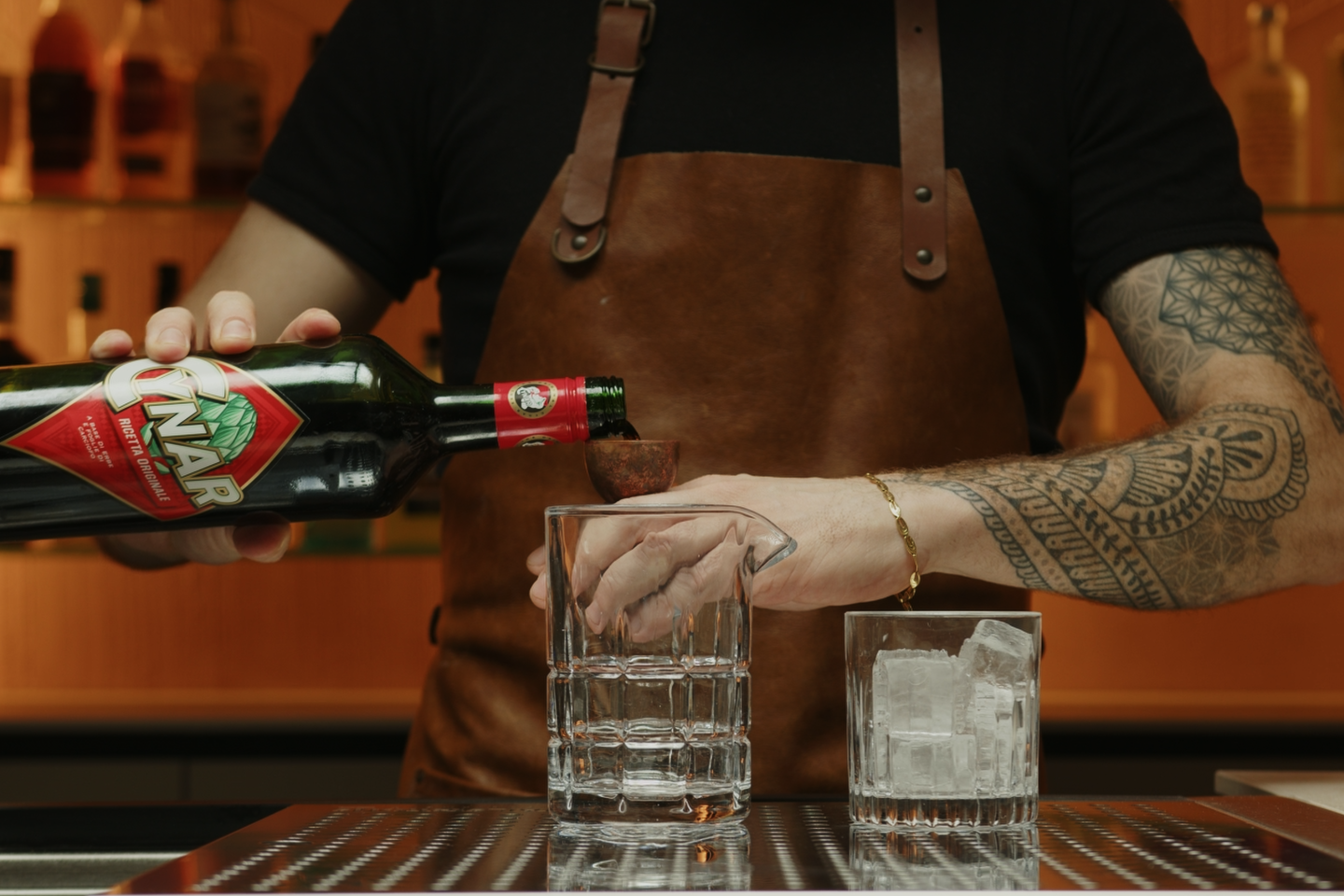 <p>Now, pour ⅓ ounce of Cynar into your mixing glass. Cynar is an Italian bitter liqueur made from artichokes and other botanicals, adding a unique complexity to your cocktail.</p>