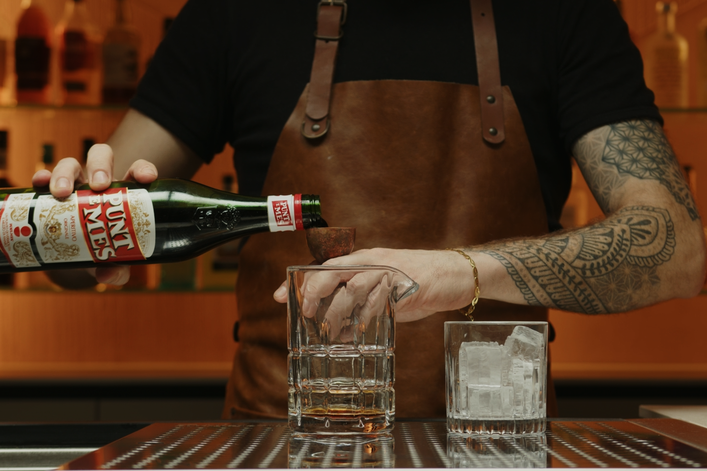 <p>Measure and add ¾ ounce of sweet vermouth to the mixing glass. The sweet vermouth brings a rich, herbal sweetness that complements the bitterness of the Cynar.</p>