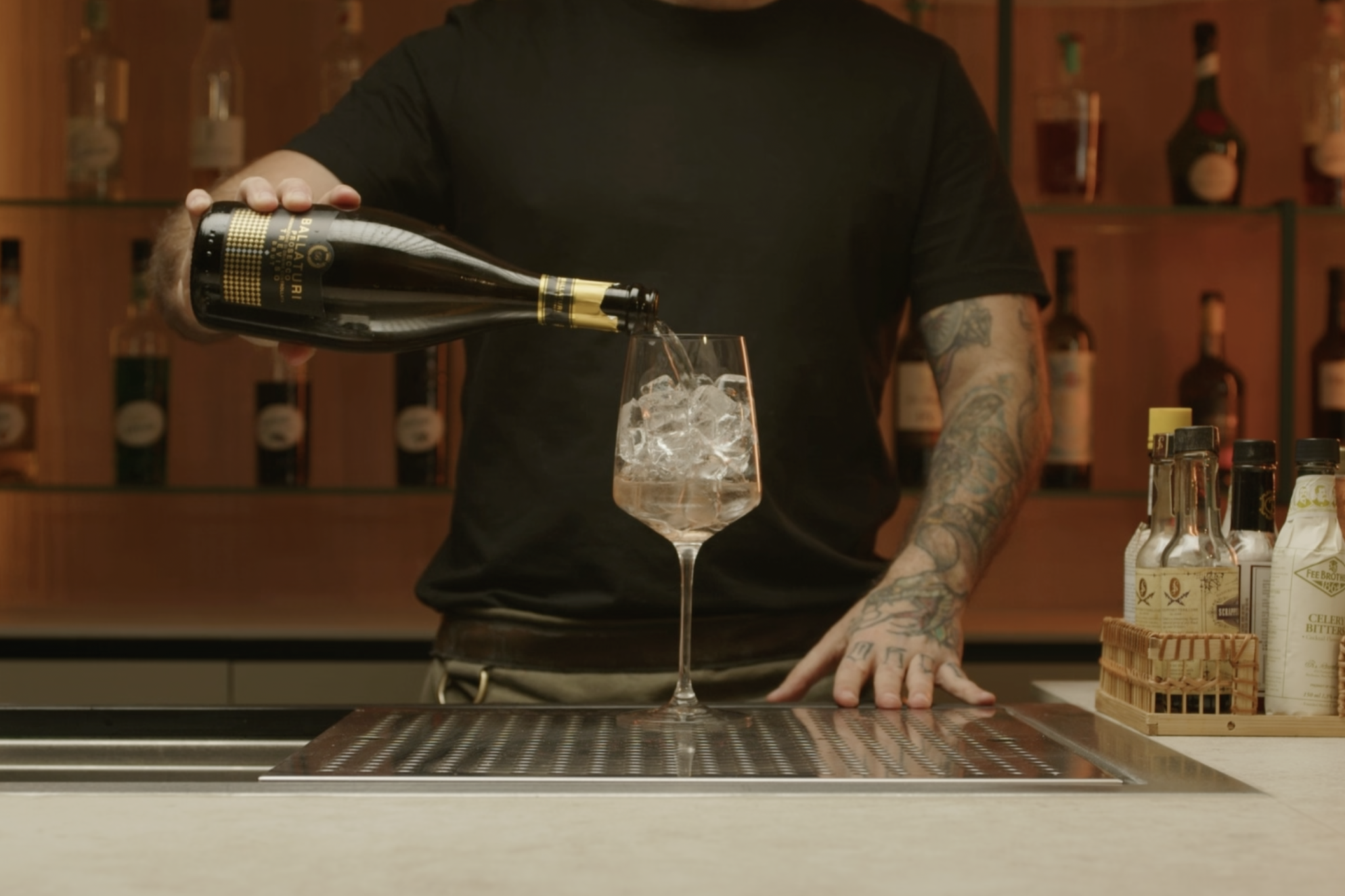 <p>Pour approximately 3 oz of Prosecco into the glass, providing a bubbly and crisp taste.</p>