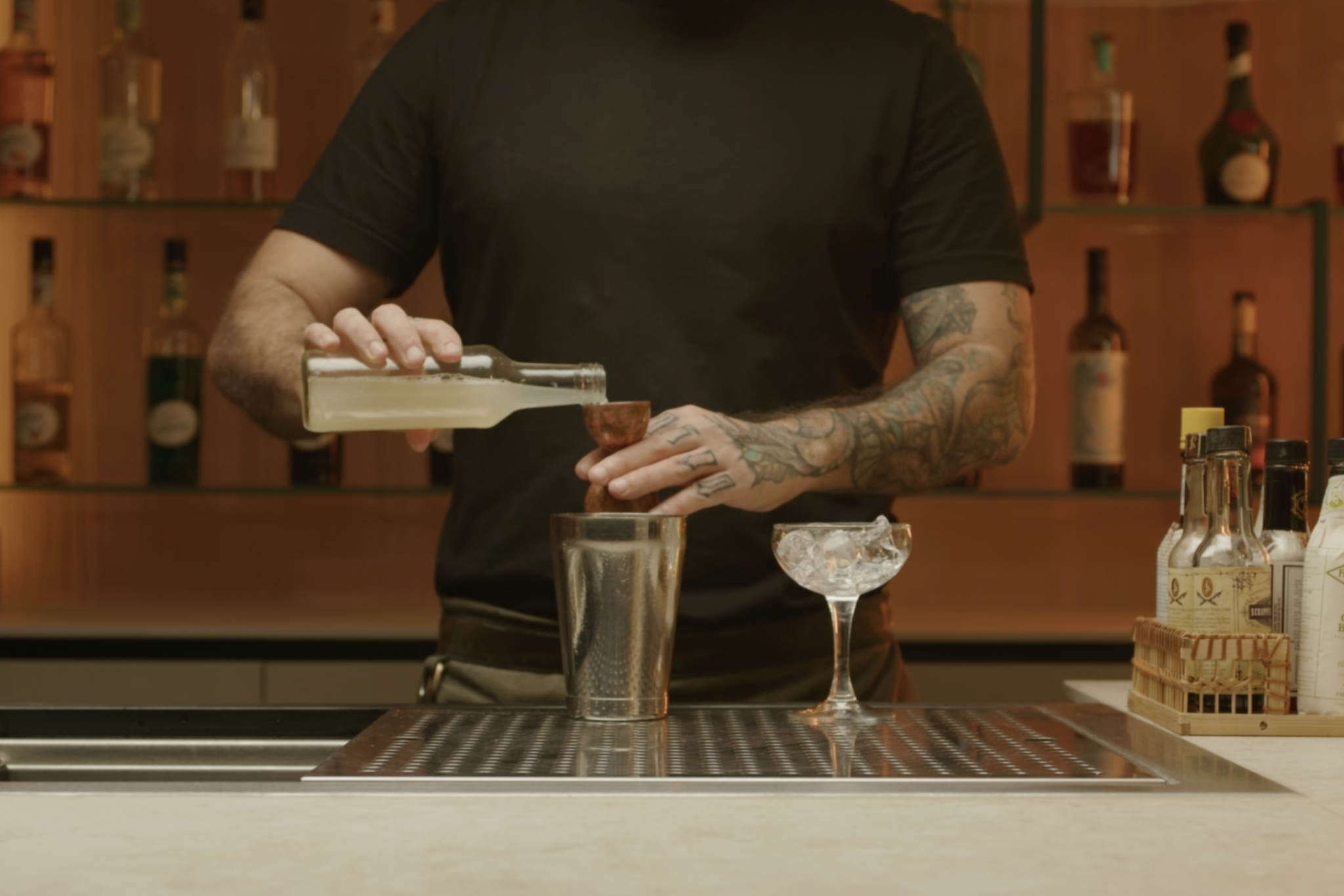 <p>Add ¼ oz of lemon juice into the shaker.</p>