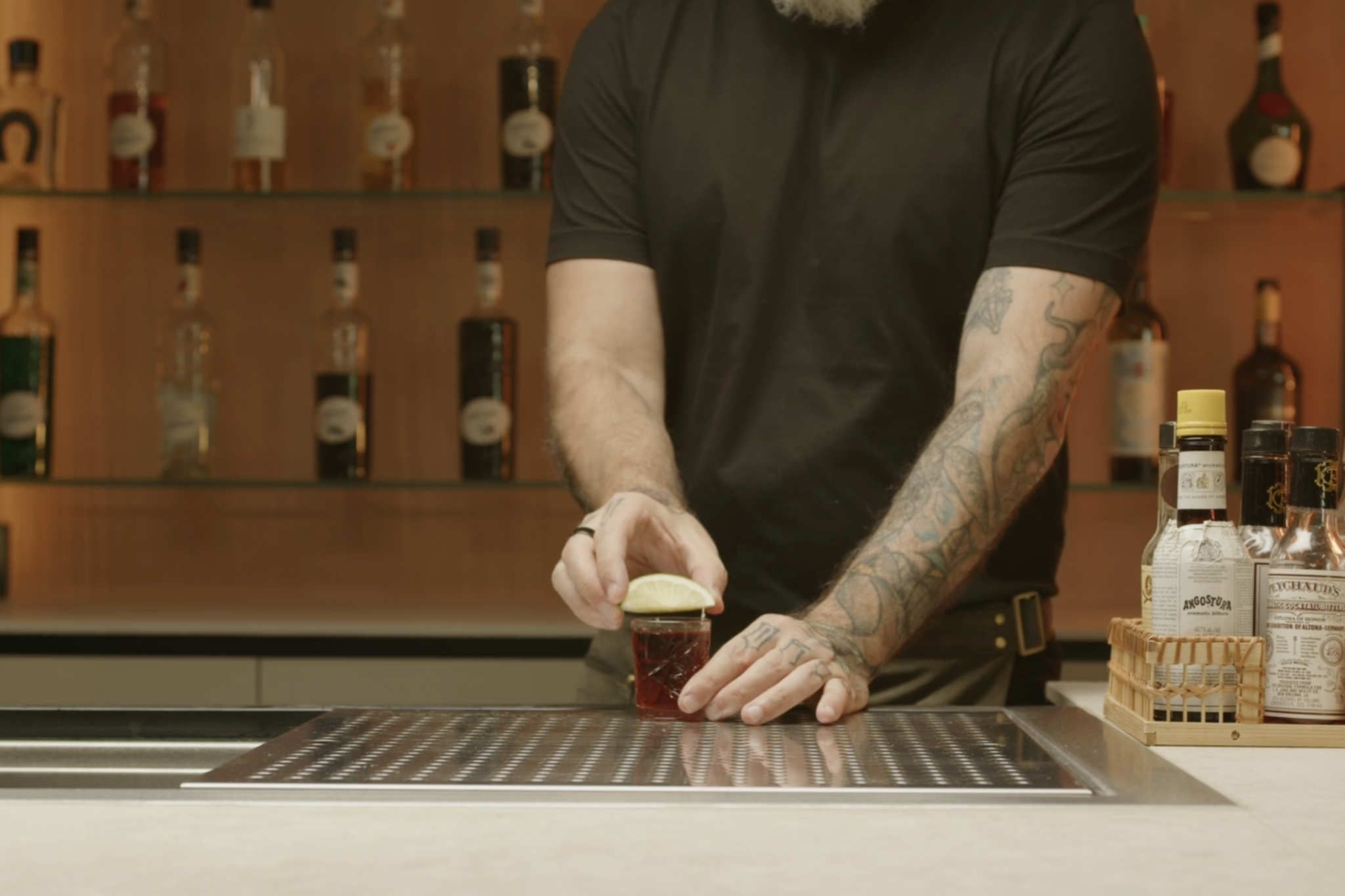 <p>Place a lime wedge on the rim of the glass for garnish, adding a touch of citrus flavor.</p>