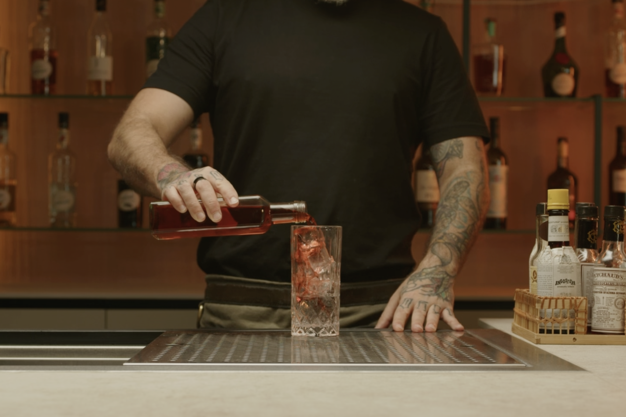 <p>Measure and pour 2 oz of cranberry juice into the glass, adding tartness and color.</p>