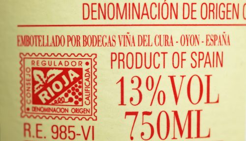 A shot of a wine label showing the percentage of ABV