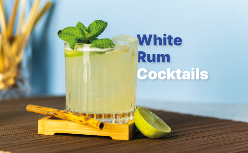 white rum cocktail with lime and cinnamon and mint leaves